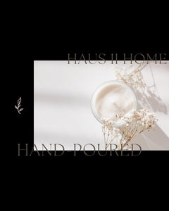 Minimalist Cream Candle with Dried flower stems, stating our name Haus II Home and Hand-poured.